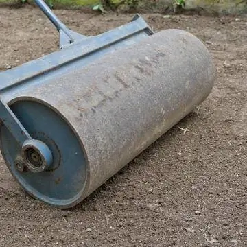 Прикатать засеянный газон