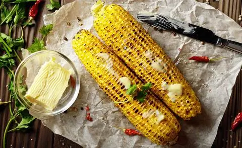Кукуруза на гриле с маслом