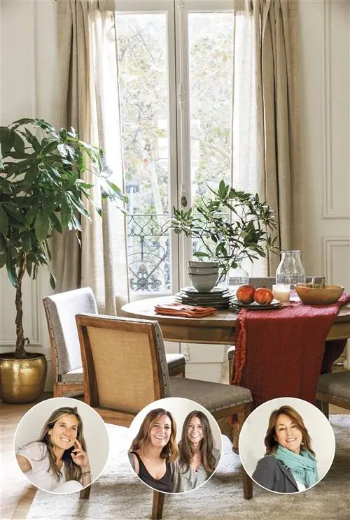 Столовая с круглым столом и мягкими стульями