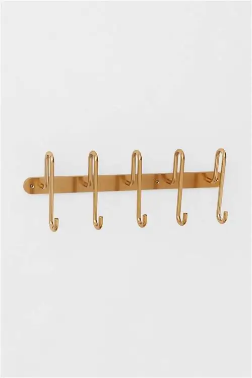 Золотая металлическая вешалка для одежды от H&M Home Золотая металлическая вешалка для одежды от H&M Home
