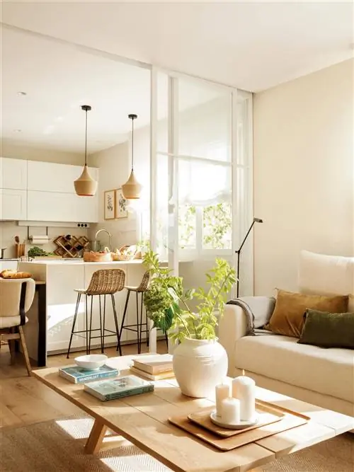 Гостиная, совмещенная с кухней, с белой стеклянной полкой