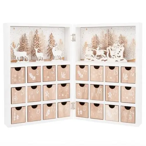 Белый и натуральный адвент-календарь в форме книги от Maisons du Monde.