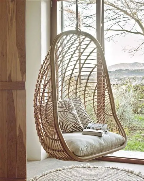 Подвесное кресло Екатерины из ротанга от Kave Home на Amazon.