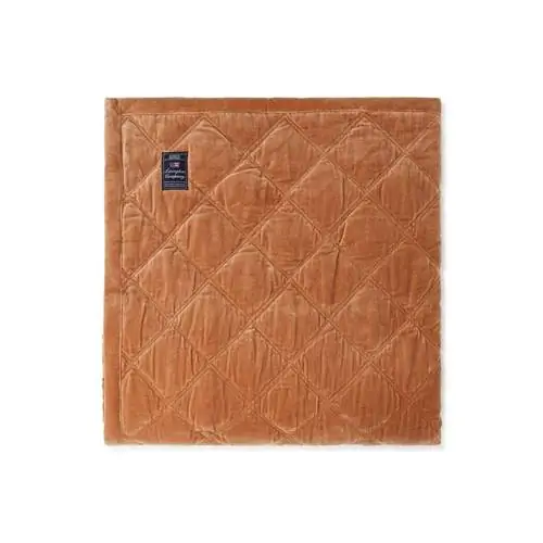 Стеганое хлопковое покрывало с бархатистым оттенком коричневого цвета от El Corte Inglés.