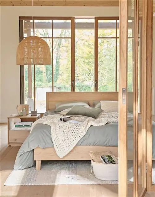 Плетеный плед цвета экрю от Maisons du Monde.