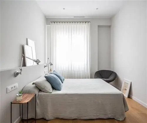 современный и минималистичный дизайн спальни в серых тонах