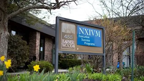 Знак NXIVM Executive Success Programs