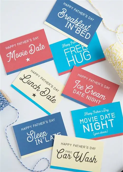 Купоны на День отца с нитками и ножницами на белом фоне