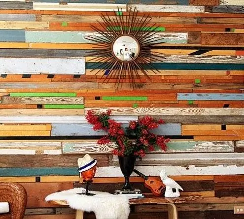 DesignSponge-sarah-salvaged-wood-wall-treatment_after2