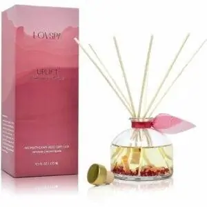 Лучший тростниковый диффузор: LOVSPA Uplift Pomegranate and Citrus Essential Oil