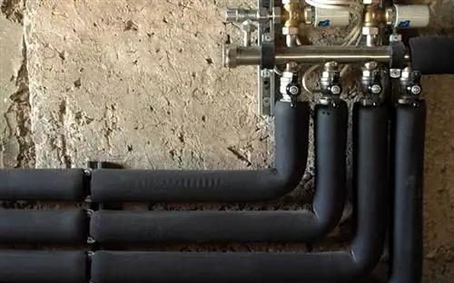 Утепленные трубы под домом