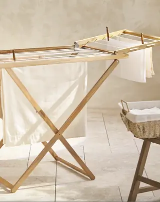 buttongroup Купить складную лошадку для одежды от Zara Home…