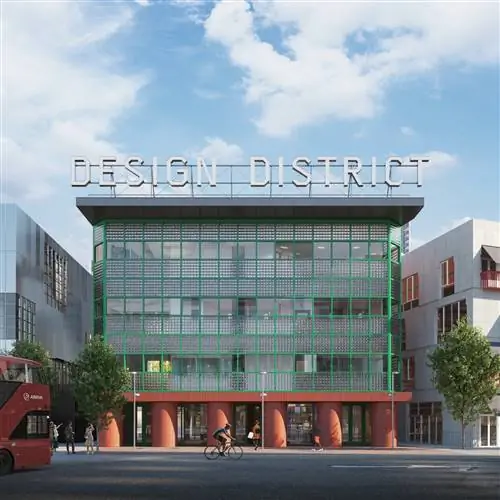 Вывеска на здании David Kohn Architects с основанием из красного кирпича и застекленным решетчатым фасадом