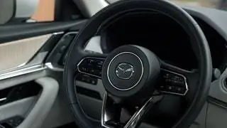 Функция помощи при посадке/высадке из автомобиля перемещает рулевое колесо вверх, а сиденье назад…