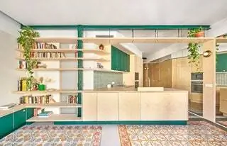Кухня для максимального увеличения пространства открыта для гостиной