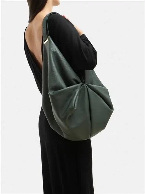 Geschenkideen von Sebastian Herkner Tasche Pull Out Tsatsas Pine Grün Beuteltasche