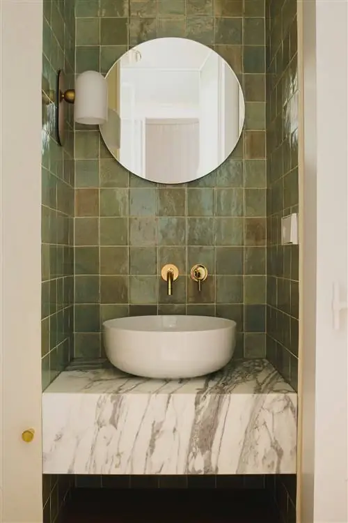 Эта квартира в районе Эшампле в Барселоне также имеет собственный туалет в средней части планировки