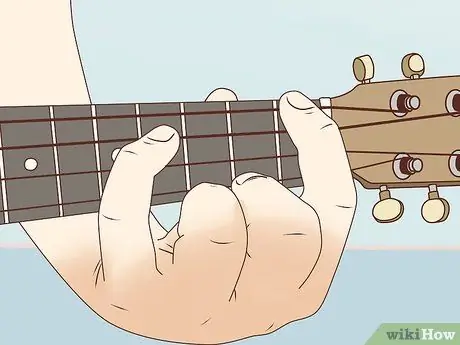 Сыграйте аккорд ми на укулеле. Шаг 6