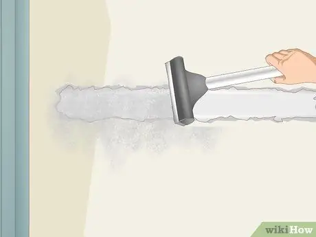 Отремонтируйте ленту для гипсокартона, отделяющуюся от стен Шаг 10