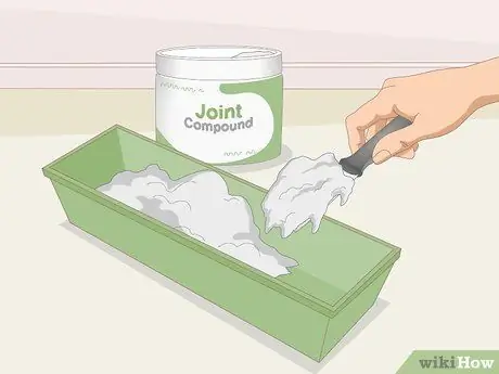 Отремонтируйте ленту для гипсокартона, отделяющуюся от стен Шаг 12