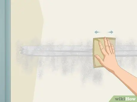 Отремонтируйте ленту для гипсокартона, отделяющуюся от стен Шаг 15