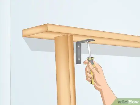 Повесьте лестницу на стену Шаг 9