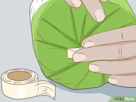 Заверните круглый подарок Шаг 17