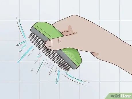 Очистите Tangle Teezer Шаг 7