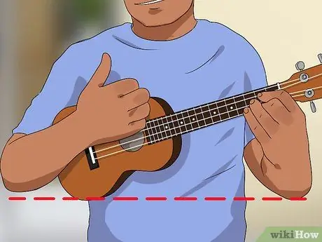 Держите укулеле Step 12