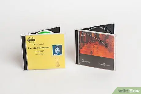 Замените футляр для компакт-диска Шаг 1