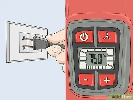 Используйте тепловую пушку для сушки краски Шаг 1