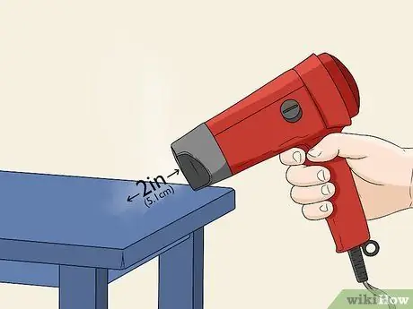 Используйте тепловую пушку для сушки краски Шаг 2