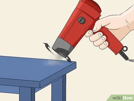 Используйте тепловую пушку для сушки краски Шаг 3