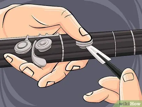 Определите протекающие пэды на деревянных духовых инструментах Шаг 8