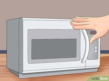 Установите микроволновую печь Шаг 1
