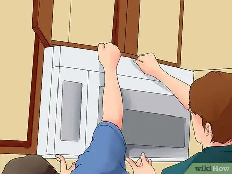 Установите микроволновую печь Step 7