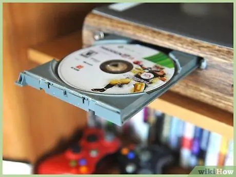 Принудительно извлечь диск, застрявший в Xbox 360 Шаг 5 Принудительно извлечь диск, застрявший в Xbox 360 Шаг 5
