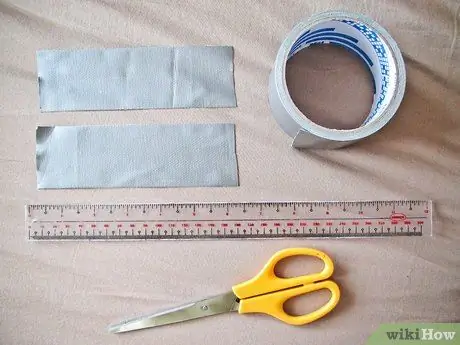 Сделайте бантик из клейкой ленты Шаг 2