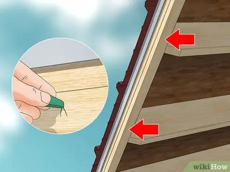 Установите водосточные желоба Шаг 6