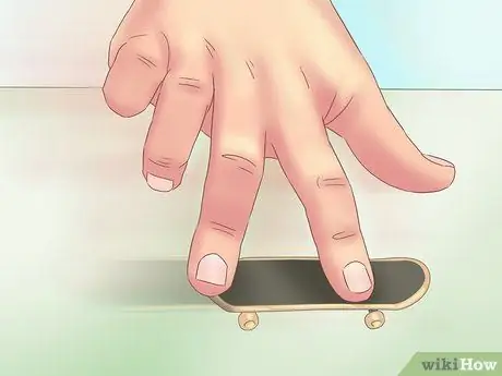 Kickflip on a Tech Deck, шаг 12