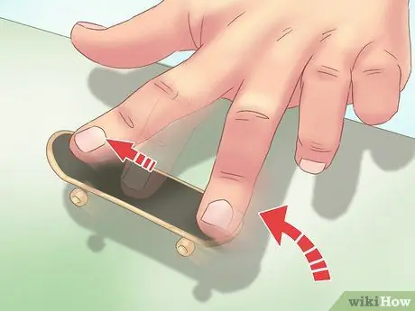 Kickflip on a Tech Deck, шаг 5