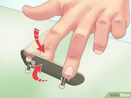 Kickflip on a Tech Deck, шаг 6