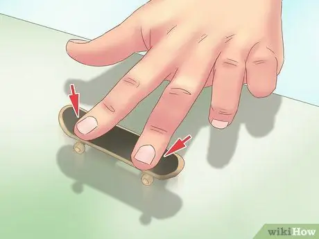 Kickflip on a Tech Deck, шаг 7