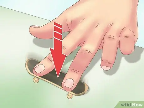 Kickflip on a Tech Deck, шаг 8