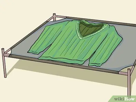 Эластичная усохшая шерстяная ткань Шаг 8