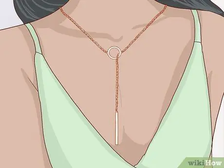 Носите ожерелье из лариата. Шаг 1