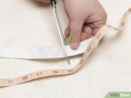 Сделайте эластичную повязку на голову. Шаг 3