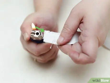 Сделайте эластичную повязку на голову. Шаг 5