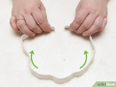 Сделайте эластичную повязку на голову. Шаг 6