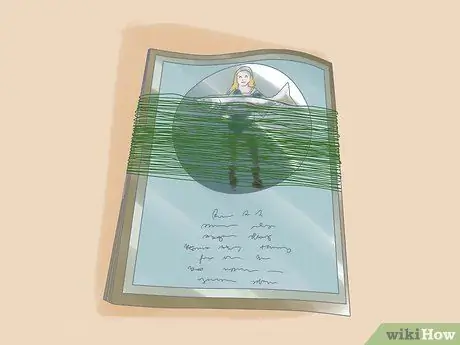 Сделайте украшение из бисерной проволоки в центре. Шаг 1